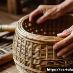 대만의 전통 공예품 구입 팁 - A close-up scene of a skilled Taiwanese artisan weaving a bamboo basket using traditional techniques...